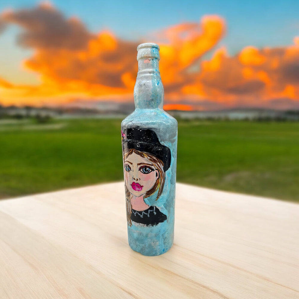 
                      
                        Hand Painted Glass Bottle - Blue Eyed
                      
                    