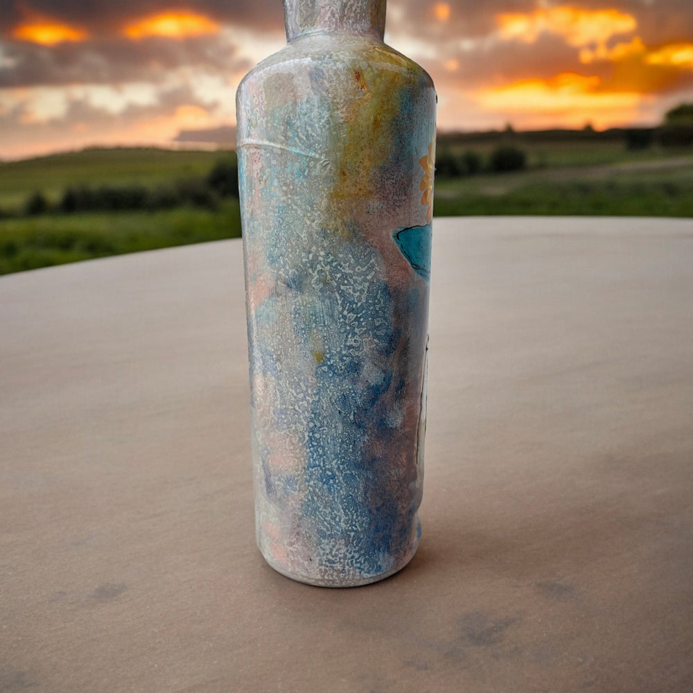 
                      
                        Hand Painted Glass Bottle - Lady in Blue hat
                      
                    