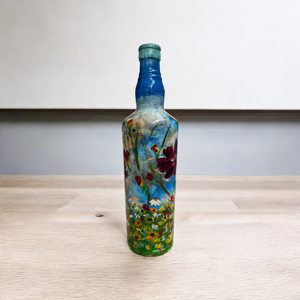 
                      
                        Hand Painted Glass Bottle - Magenta Flowers in Blue
                      
                    