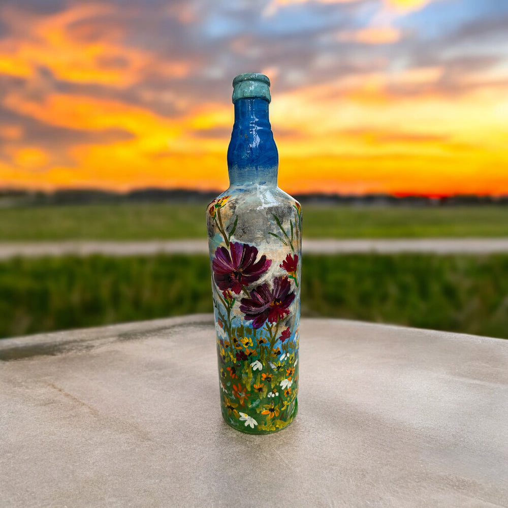 
                      
                        Hand Painted Glass Bottle - Magenta Flowers in Blue
                      
                    